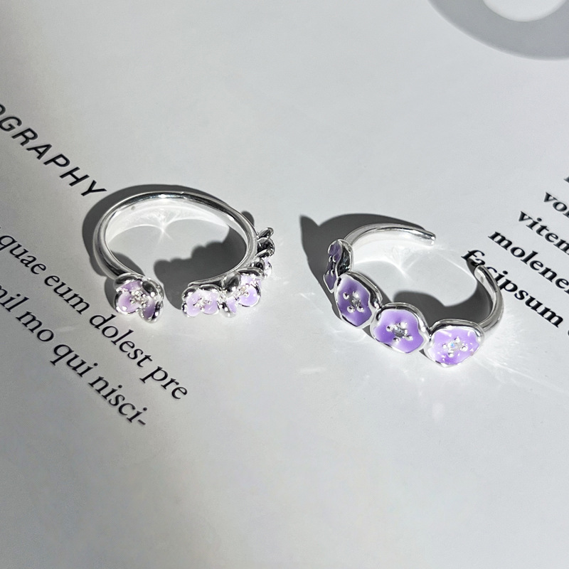 The purple flower sweet and cool open ring with an ethereal charm makes a girl look fairer. It's a unique, exquisite and versatile ring with a cold style details Picture