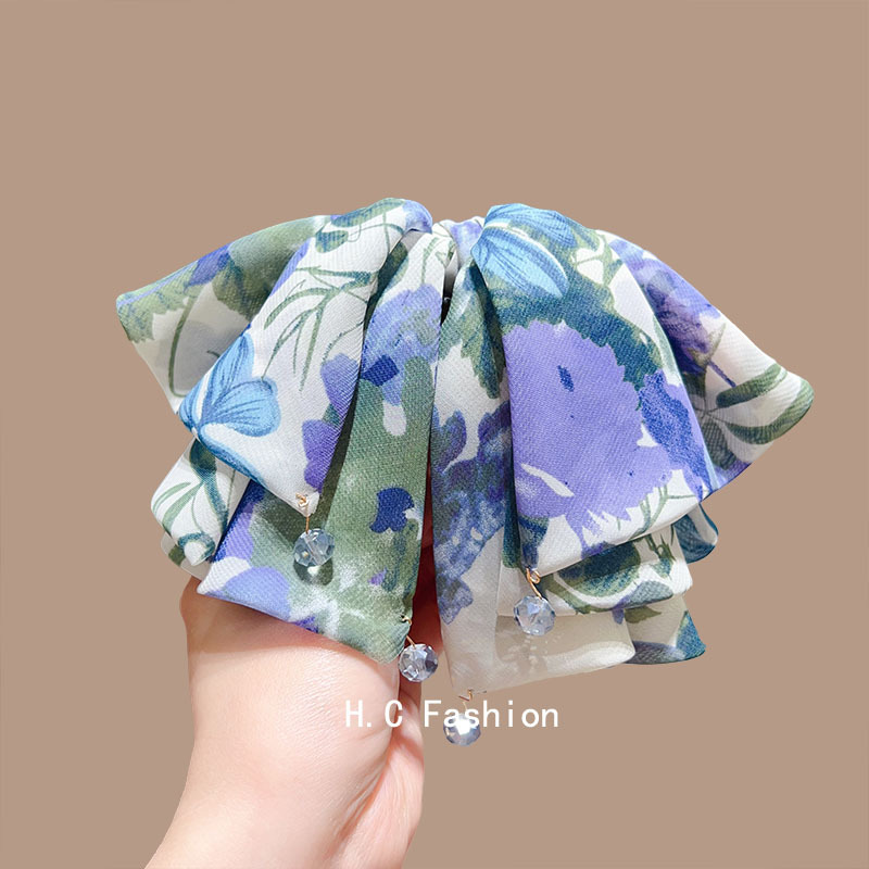 A new style of elegant bow ponytail print grabber for women with a high-end retro back head updo shark clip accessory full figure