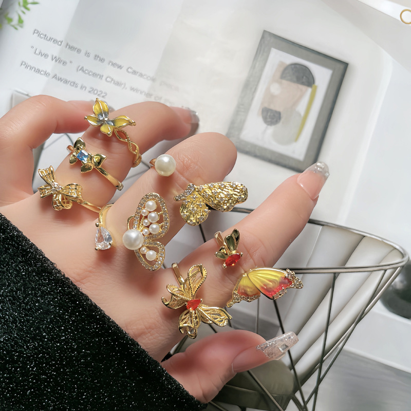 A light luxury and high-end golden butterfly-shaped opening ring for women on Instagram, with a cold and cool style, sweet and unique, exquisite and niche food ring full figure