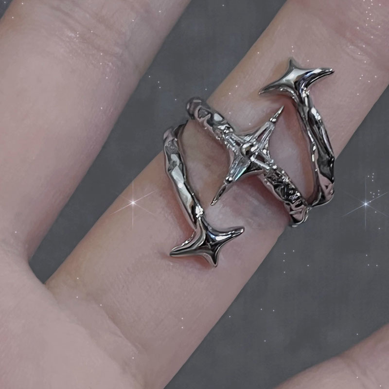 A unique open-top ring with a dark punk style from Europe and America, a cool and cold cross-shaped irregular starlight ring for women on Instagram Application Scenario