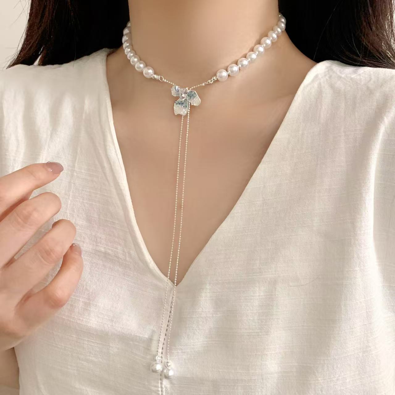 French blue iris pearl necklace with a unique feminine touch, a pull-out collarbone chain, and a light luxury design Specification drawing