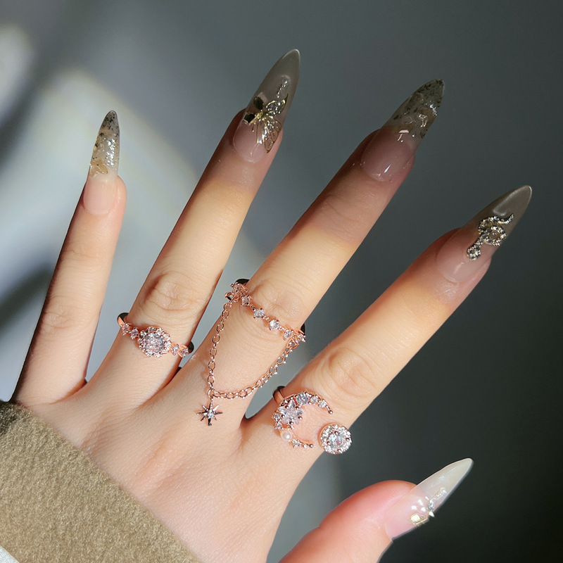 Cross-border best-selling rose gold fringed diamond star and moon ring for women, simple, fashionable and individual European and American style ring Specification drawing
