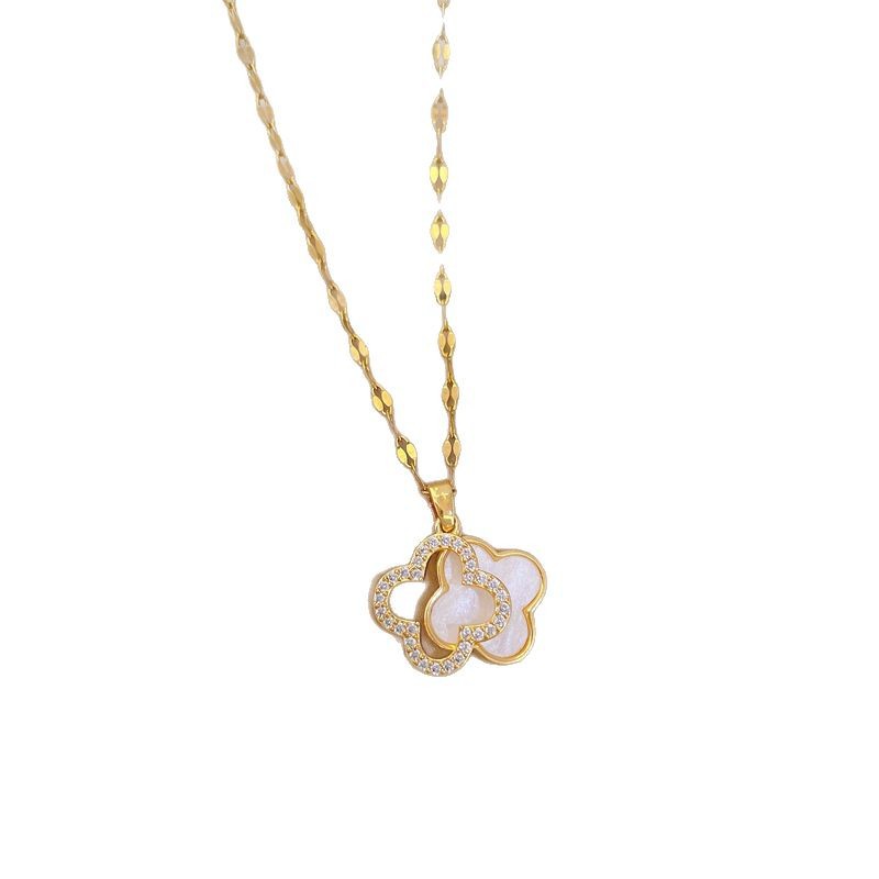 【 Titanium Steel 】 The new diamond-encrusted four-leaf flower necklace exudes a feminine charm and a sense of sophistication. The double-sided shell collarbone chain is a bestseller Item Picture