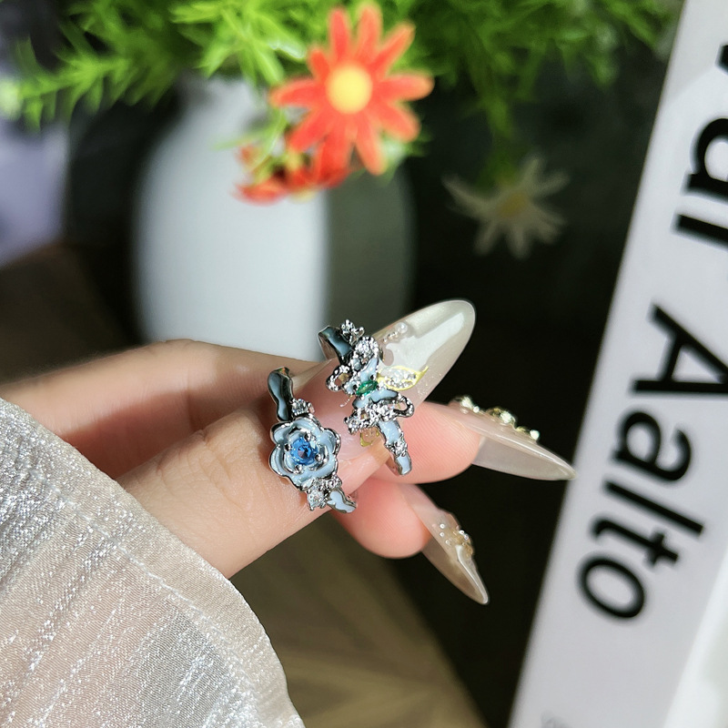 Elegant jasmine blue diamond butterfly couple ring, with unique enamel flowers, exquisite and niche design sense, high-end ring full figure