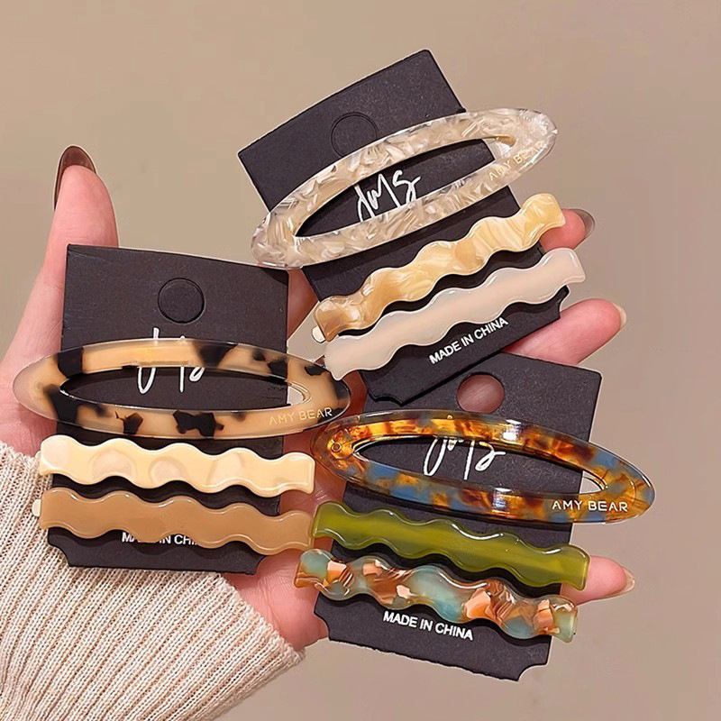 Three new high-end acetate hairpins for women in 2025, featuring a one-line fringe, side clip and bb clip headwear details Picture