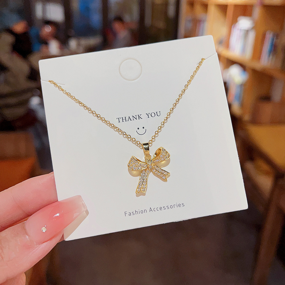Sweet bow titanium steel necklace, women's light luxury, niche design sense, high-end collarbone chain, versatile neck chain accessory for Internet celebrities Specification drawing