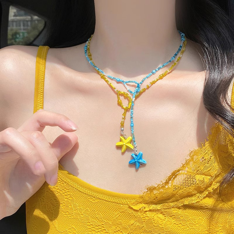 Dopamine colorful beaded butterfly necklace, a light luxury and niche design for women, a millennial style collarbone chain, a sweet and cool neck chain for women details Picture