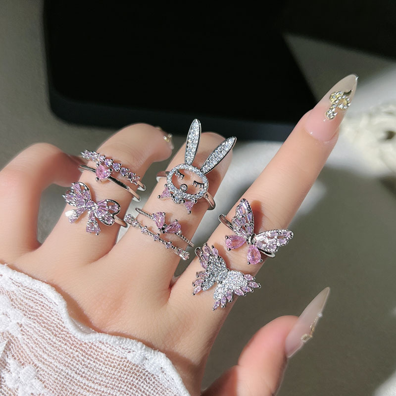 A new sweet pink diamond double-layer elegant heart-shaped butterfly light luxury ring with a cold female style and a unique rabbit creative ring full figure