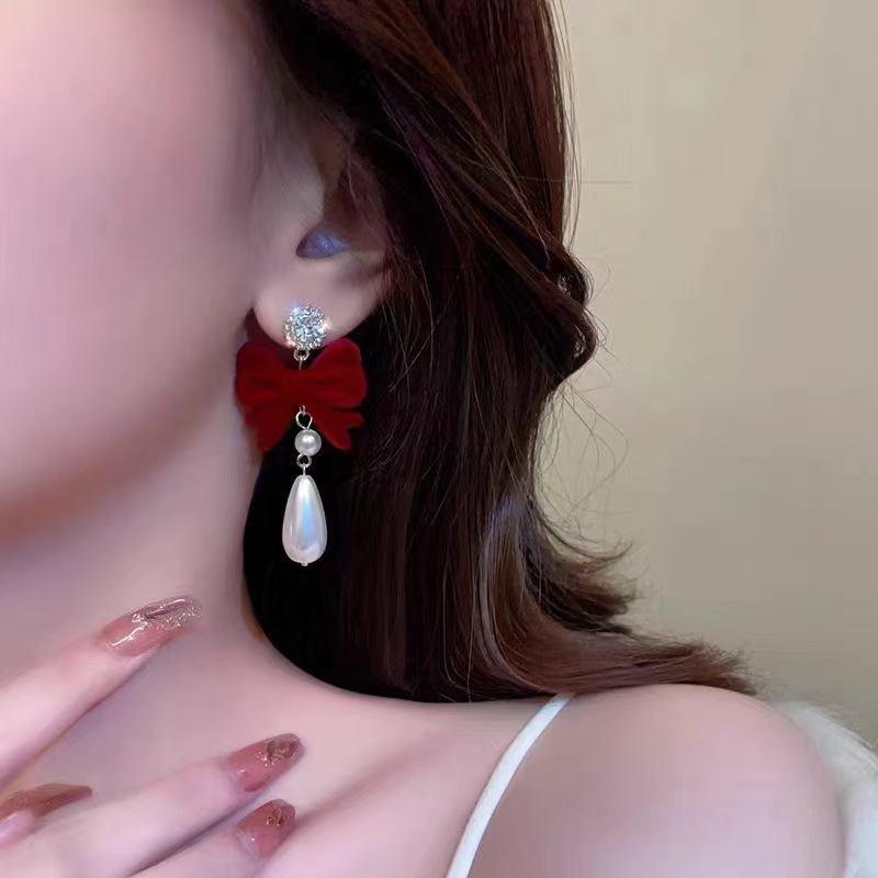 Wine red velvet bow pearl earrings exude a sweet and girlish charm. Long and high-end New Year earrings for autumn and winter details Picture