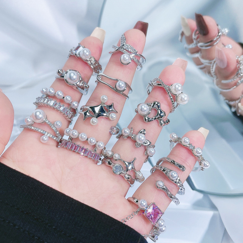 A simple and irregular geometric pearl-inlaid open-top ring with a touch of high-end women's elegance, a light luxury and fashionable style, and a cold style ring full figure