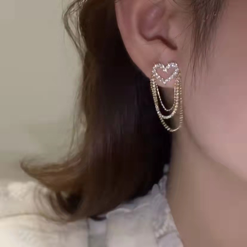 Hollowed-out heart-shaped super fairy earrings for women spring and summer, new, niche and high-end style stud earrings, light luxury earrings, tassels and retro earrings details Picture
