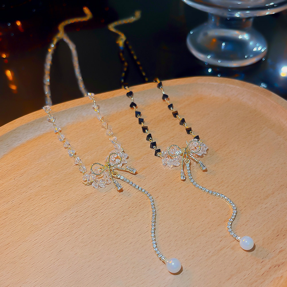 European and American super fairy crystal tassel bow necklace, women's niche light luxury exquisite collarbone chain, ins style sweater chain full figure
