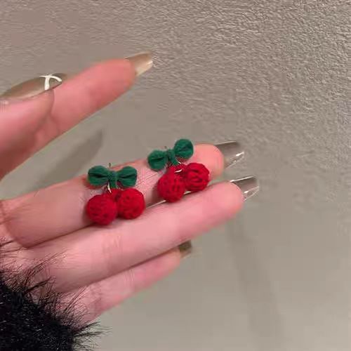 She's a sweet girl! Autumn and winter retro velvet red cherry stud earrings 2025 French gentle berry red furry earrings details Picture