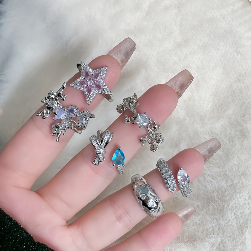 French-style gentle and elegant bow star-shaped opening ring for women, a niche and high-end, light luxury irregular butterfly ring full figure