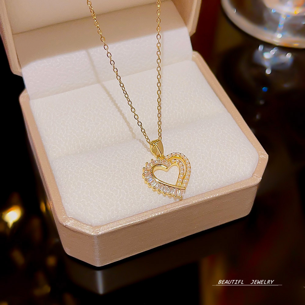 Hollow double-layer heart-shaped pendant, a popular online hit accessory, simple zircon collarbone chain, Korean version pearl necklace accessory for women full figure