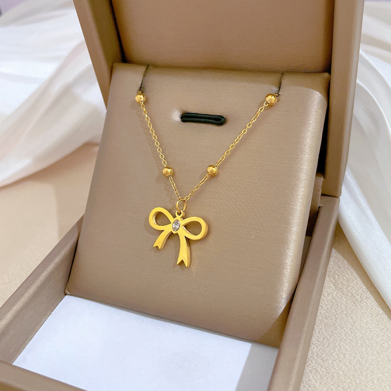 【 Titanium Steel throughout 】 Zircon bow, simple style furnace, real gold necklace, female Instagram influencer collarbone chain accessory full figure
