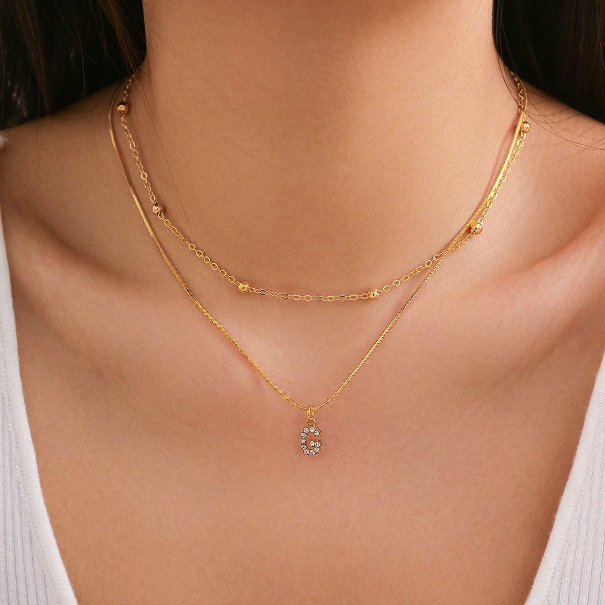 European and American cross-border simple diamond-encruted English letter pendant, double layer necklace collarbone chain, versatile snake bone necklace for women full figure