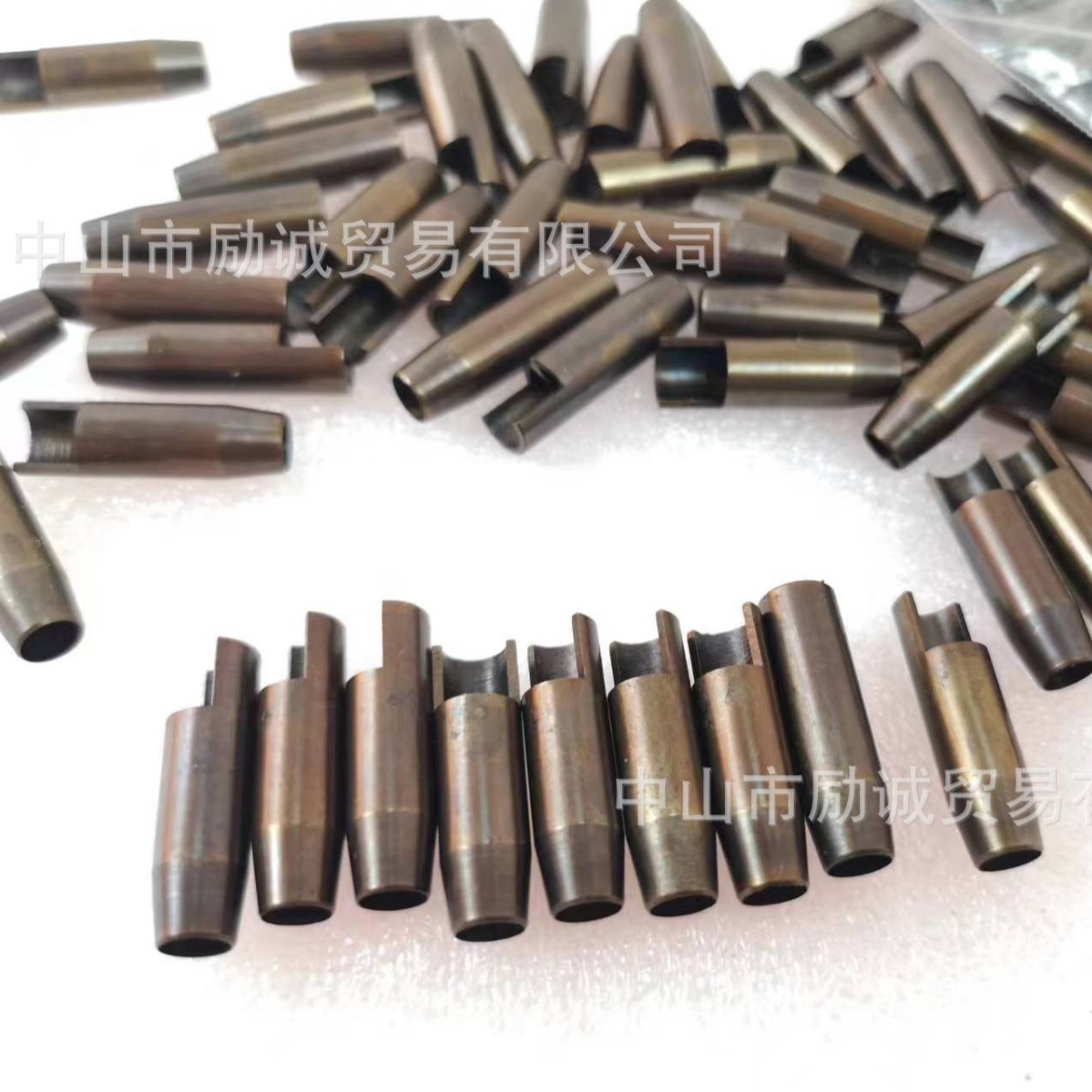 After die-cutting holes with a common post-cleaning waste punching laser die, the height of the waste punched holes is 23.8-24mm, and they are circular punched with an iron knife full figure