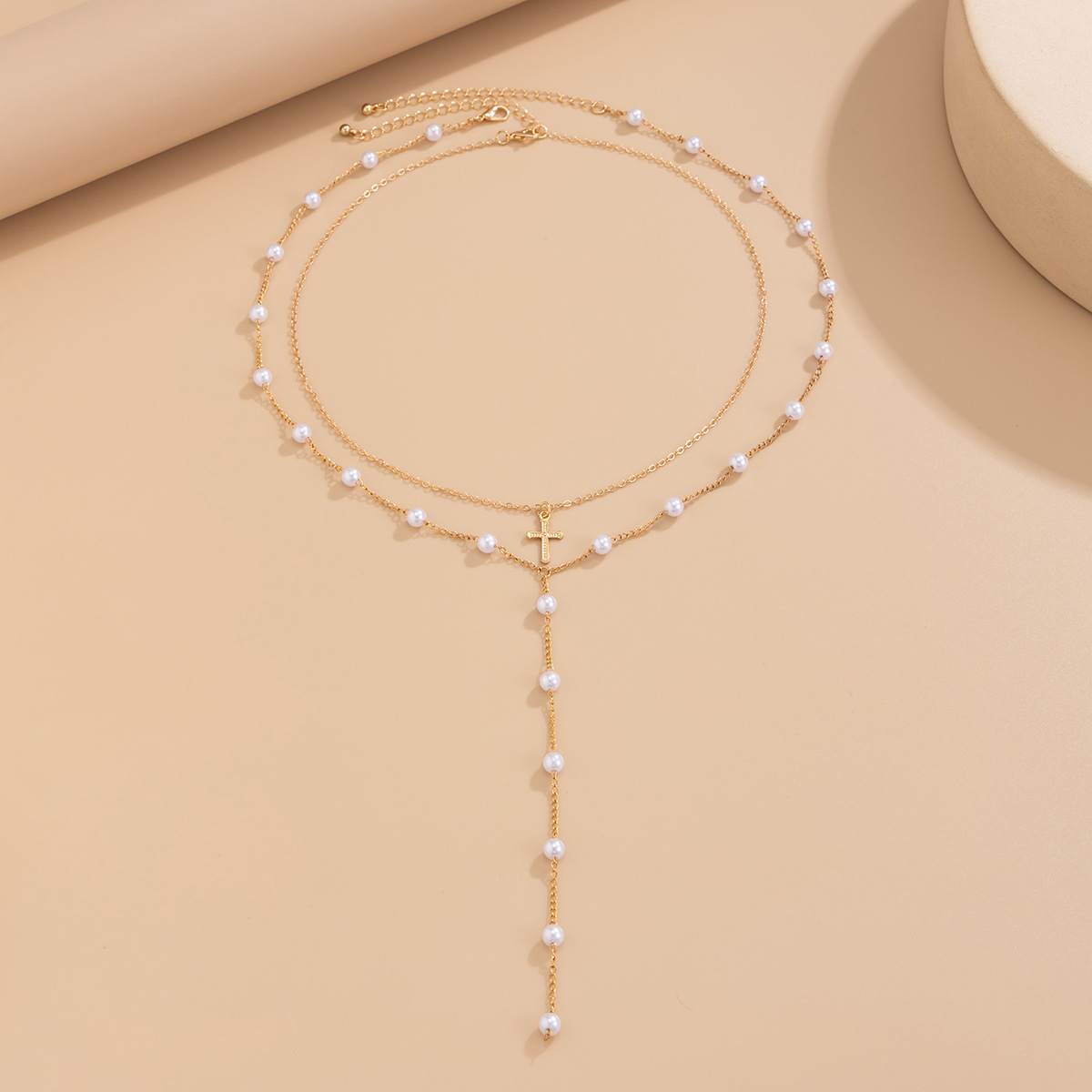 European and American cross-border accessories bikini sexy multi-layer pearl collarbone chain cross pendant tassel alloy necklace Application Scenario