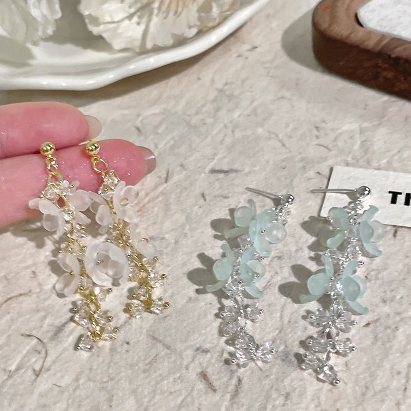 Stunning flower tassel stud earrings for women, super ethereal seaside vacation style earrings, fashionable and elegant round face earrings details Picture