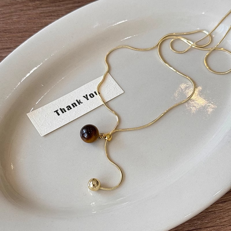 Korean Maillard Tiger cat eye stone collarbone chain 2024 autumn/Winter long sweater chain feel retro personality necklace details Picture