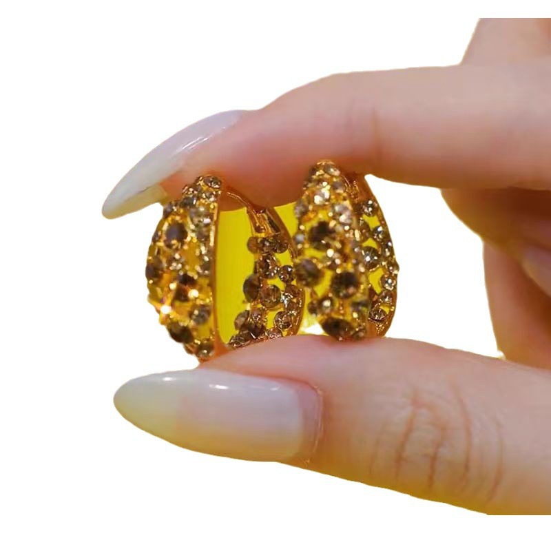 Sparkling Zircon ear loops and ear rings feature an ins trendy, high-end, niche and light luxury design. These earrings are unique, cross-border and fashionable Item Picture