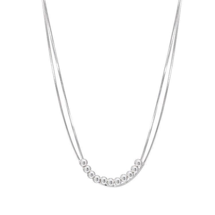 This simple double-layer round bead metal necklace exudes a unique, individualistic, fashionable and versatile charm. It features a collarbone chain design Item Picture
