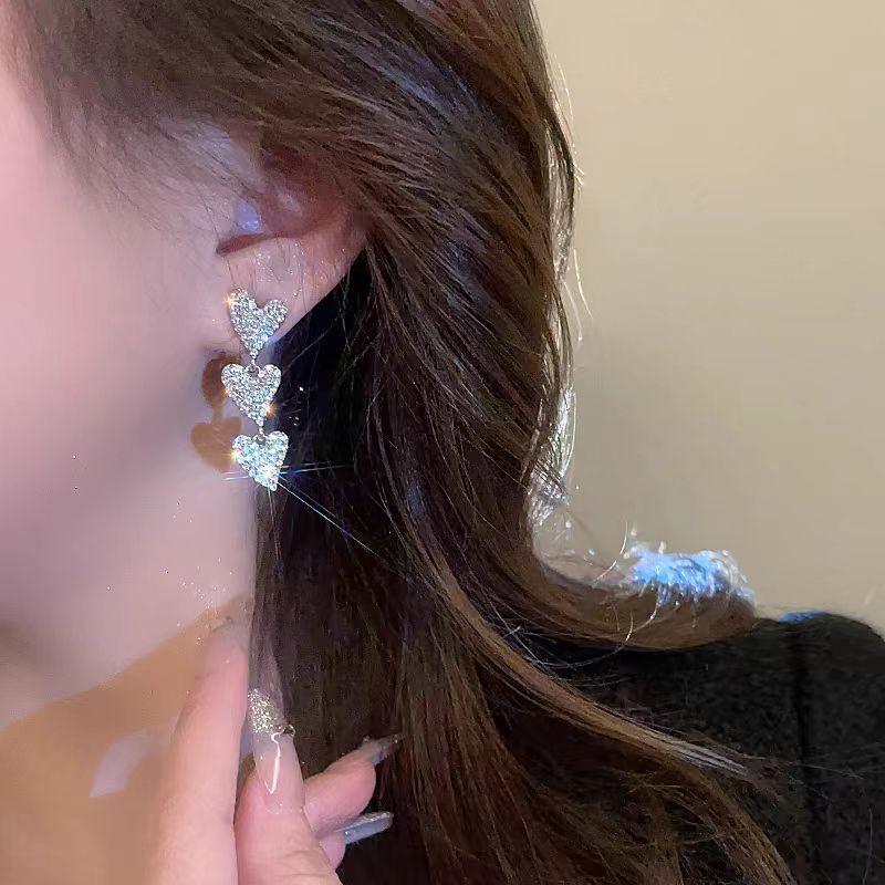 Long zircon heart-shaped tassel earrings, a niche design for women, 2025 new style stud earrings, elegant and high-end ear clips and earrings details Picture