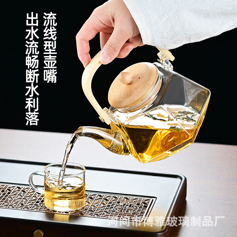 Wholesale high borosilicate glass multi-faceted teapots, heat-resistant wooden handle teapots, flower teapots, and tea-water separation teapots for roasting around a stove details Picture