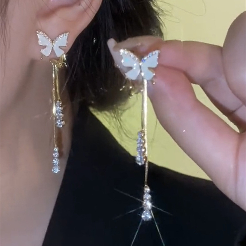 A pair of women's light luxury, niche and high-end long earrings with butterfly tassel stud earrings, featuring an ins niche design sense details Picture
