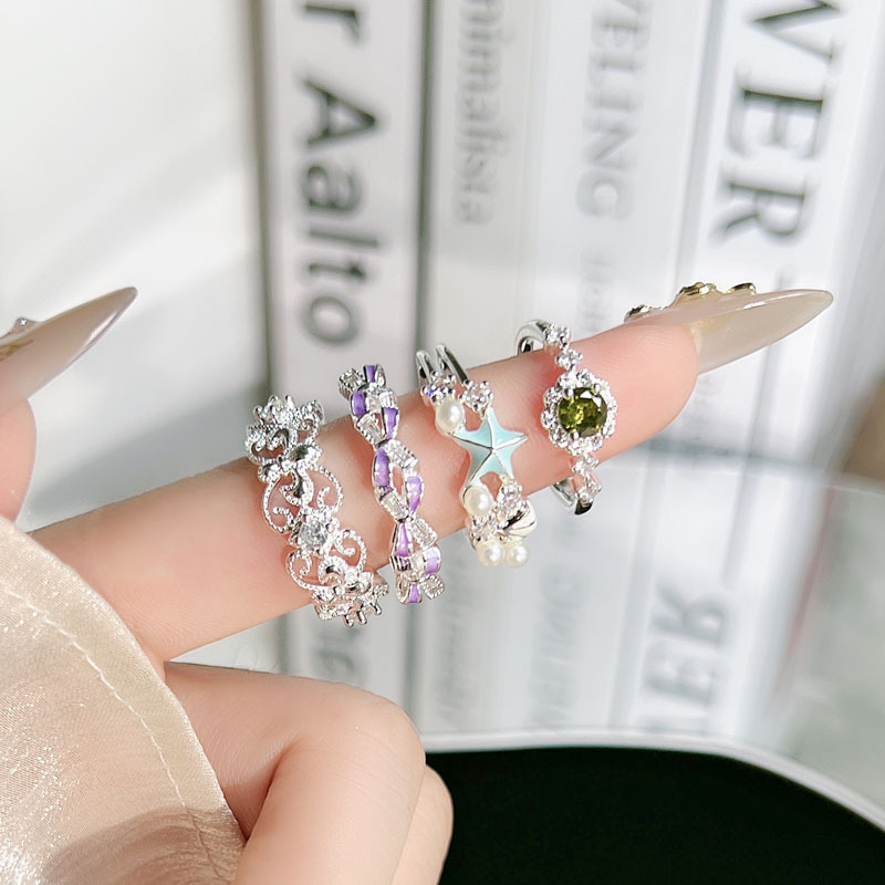 New Chinese-style retro hollowed-out iris flower simple open ring, feminine charm bow, star pearl fashionable ring full figure