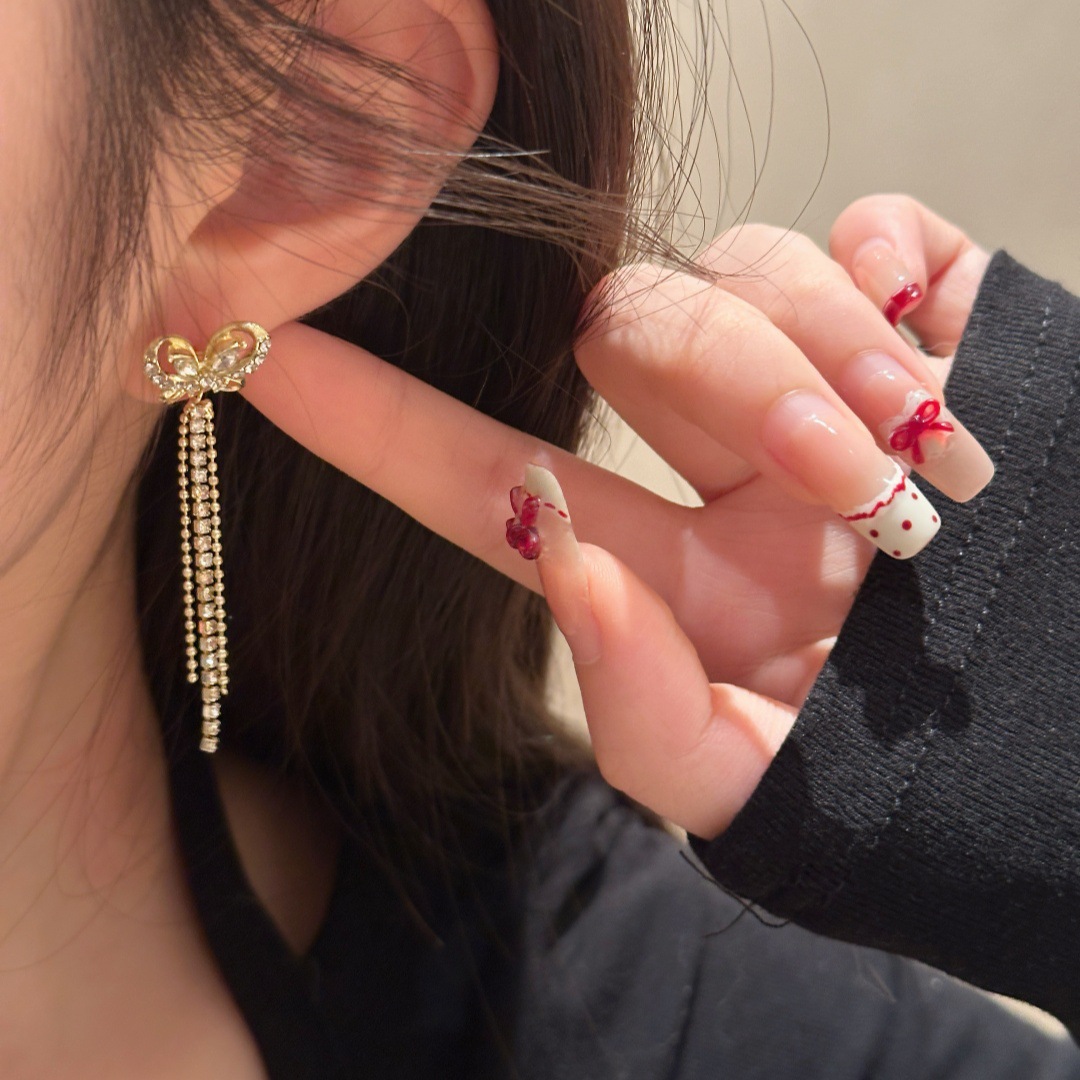 Wholesale of Japanese and Korean light luxury high-end micro-inset zircon butterfly tassel earrings, exquisite, fashionable, versatile and super shiny earrings details Picture