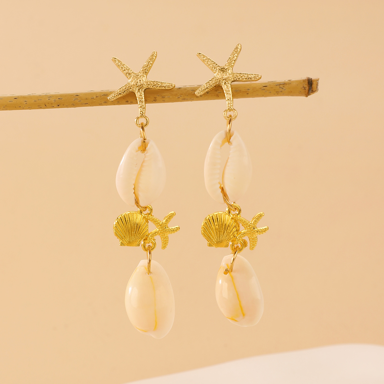 European and American beach vacation style golden conch and starfish pendants, stud earrings, earrings, women's cross-border export earrings wholesale Specification drawing
