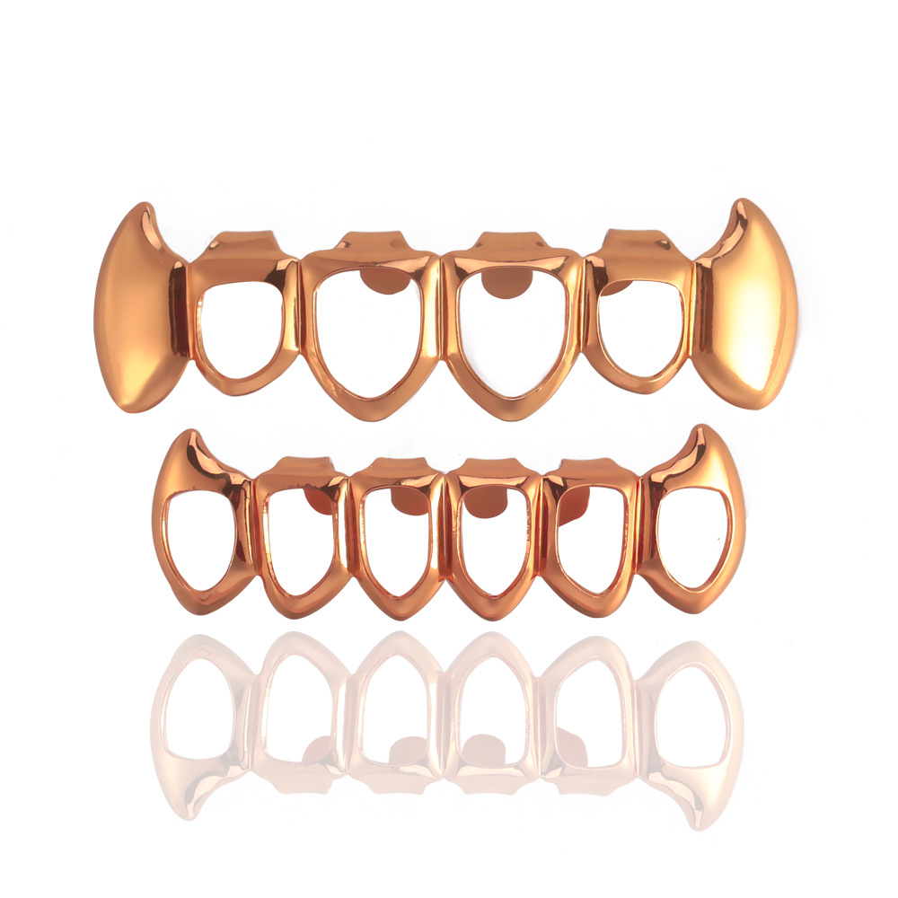 The manufacturer supplies four-hole pointed smooth HIPHOP Halloween denture props and masquerade party props Specification drawing