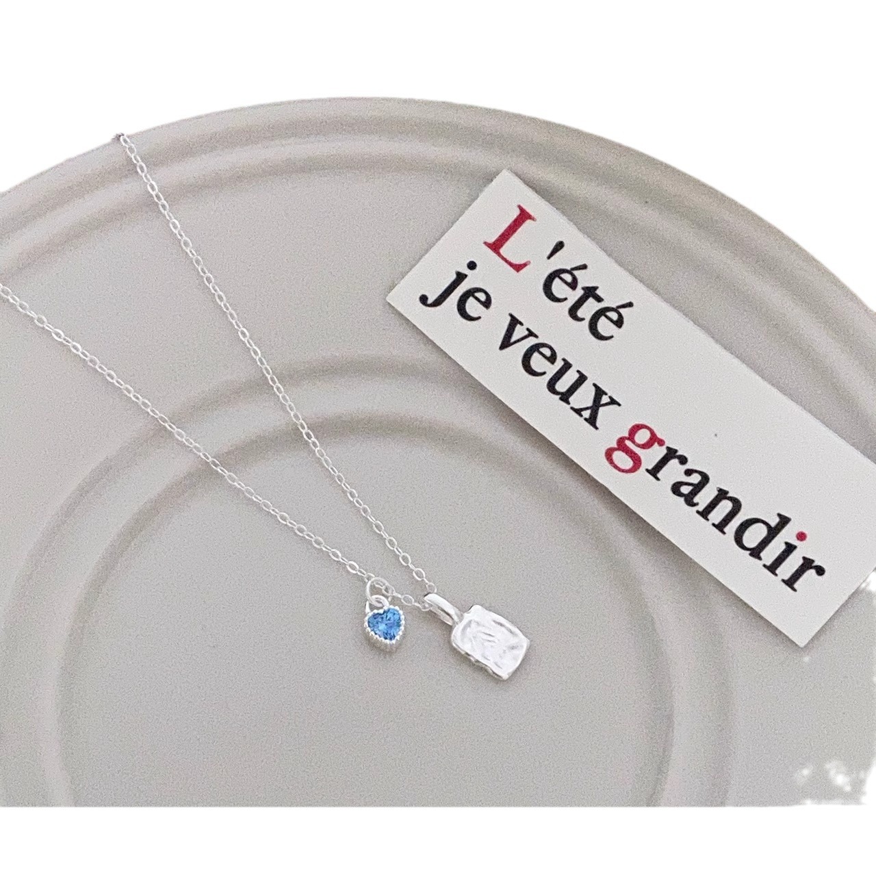 Simple, niche, irregularly textioned square pendant, blue zircon heart-shaped necklace, versatile collarbone chain for women Item Picture