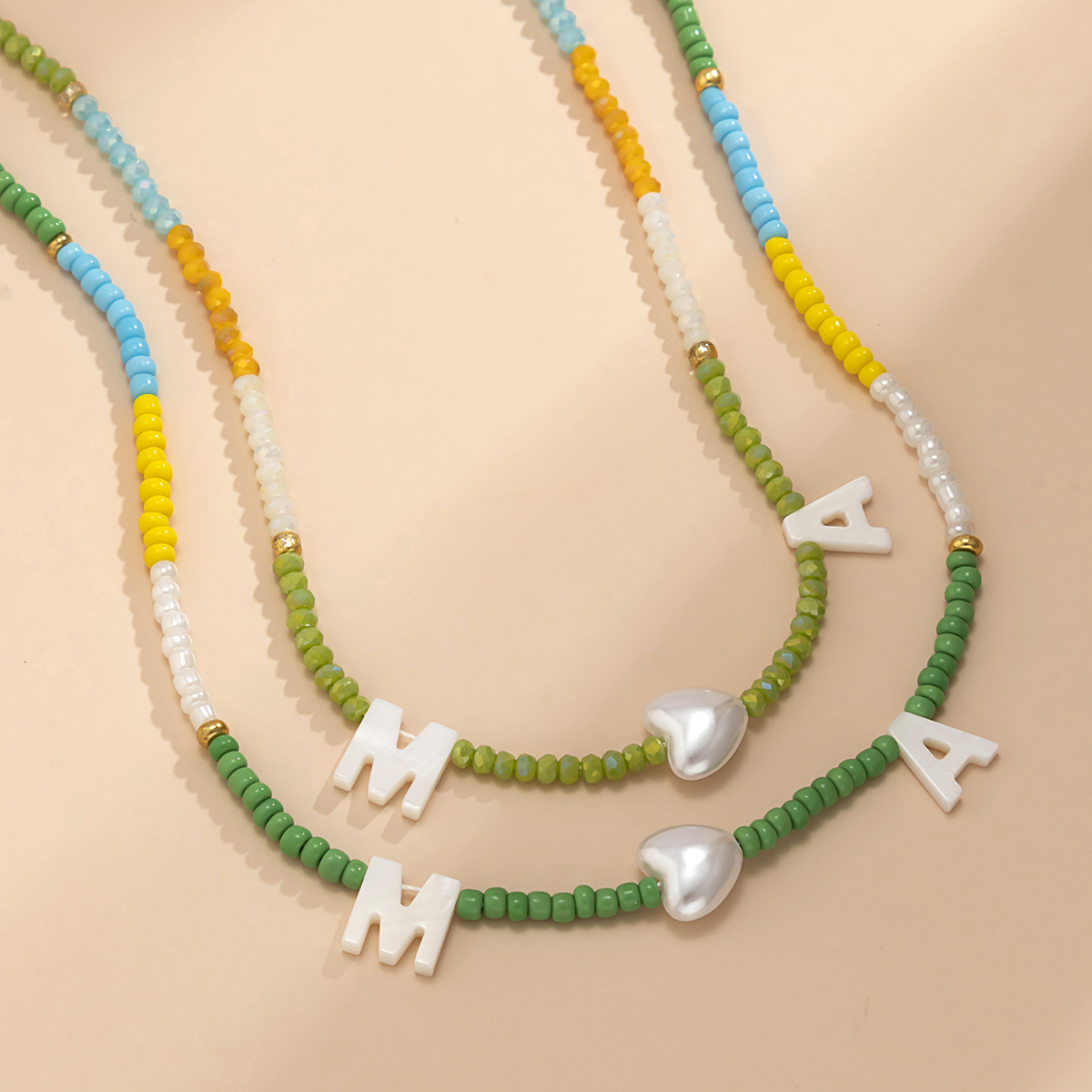 European and American cross-border hand-woven rice bead letter necklace, women's retro ethnic style pearl shell beaded necklace Application Scenario
