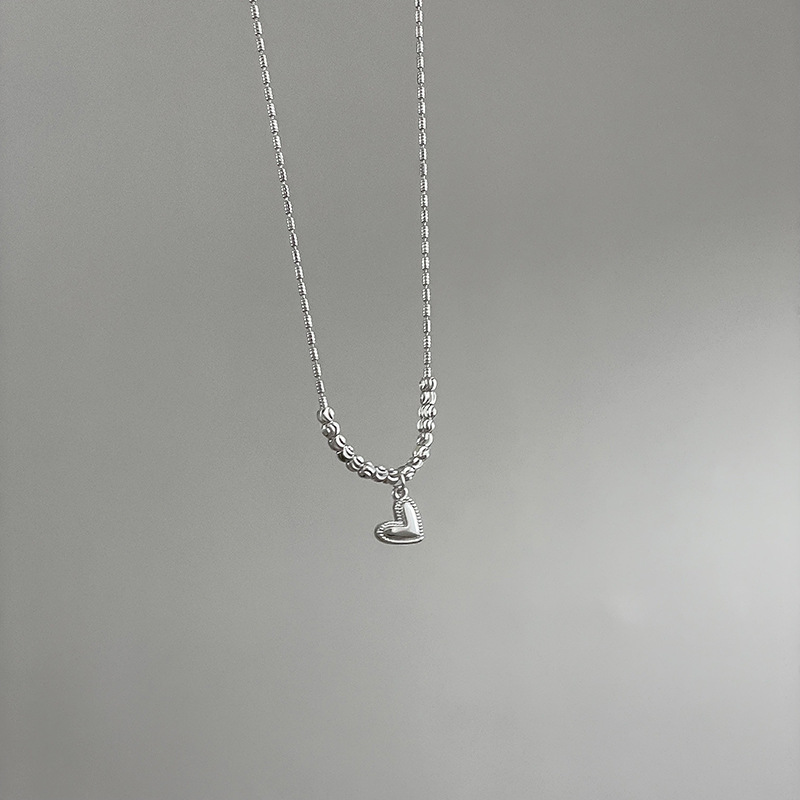 Extremely fine silver heart-shaped pendant necklace, a light luxury and niche accessory for women, collarbone chain, French style sweater chain decoration Application Scenario