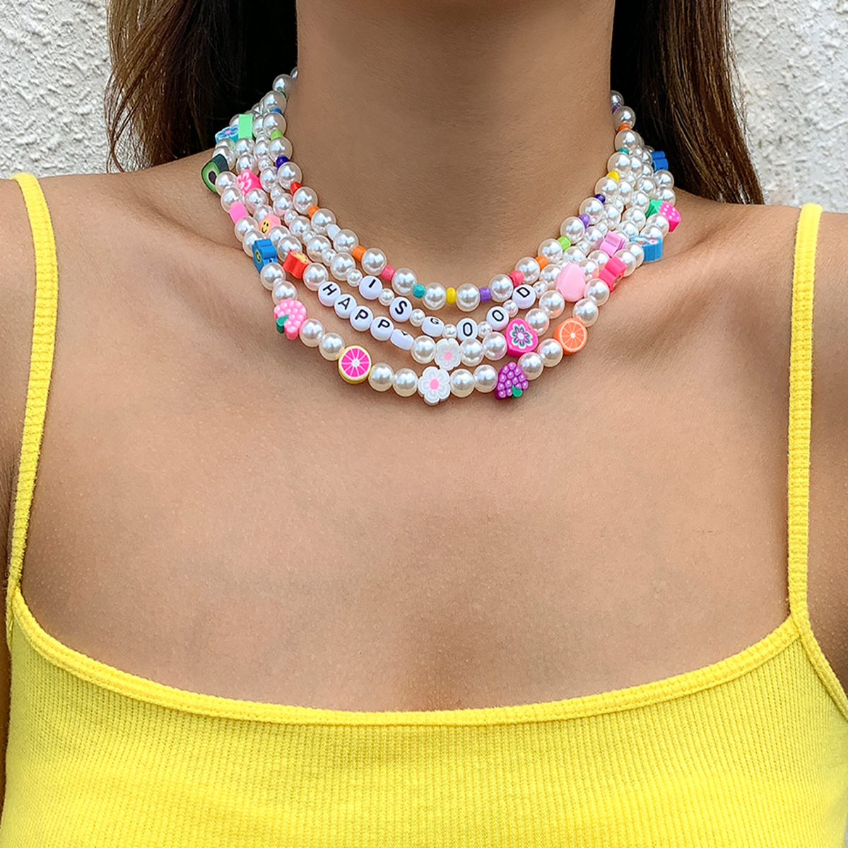A pastoral and fresh, color-blocking fruit soft clay layered necklace, a retro European and American imitation pearl acrylic letter collarbone chain Specification drawing