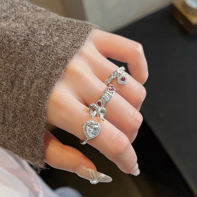 A light luxury and high-end heart-shaped diamond open ring for women on Instagram, with a cold and elegant style, a bow-shaped heart-shaped zircon ring Specification drawing