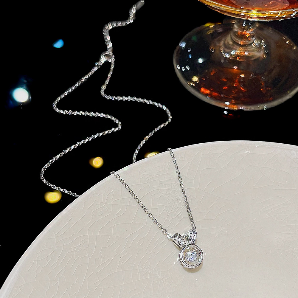 A cute and lively student rabbit necklace, a unique Korean version of a girl's heart pendant, and a stylish titanium steel collarbone necklace accessory details Picture