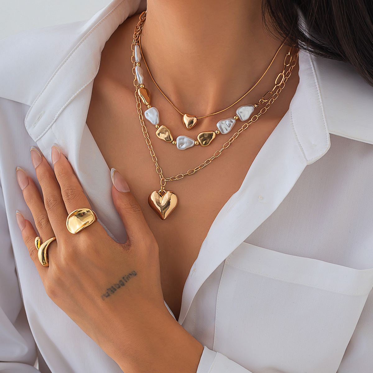 European and American cross-border jewelry, Baroque heart tassel pendant, collarbone chain, irregular flat pearl necklace set details Picture