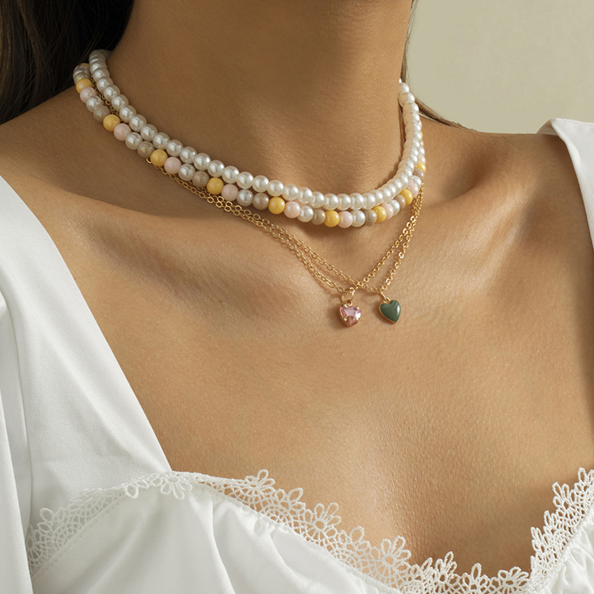 European and American cross-border retro and simple pearl alloy set necklace, personalized tassel oil drip peach heart water diamond neckpiece details Picture