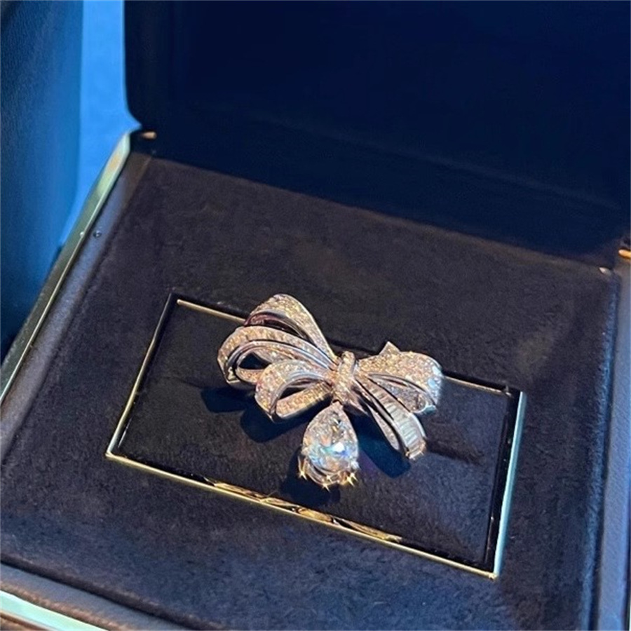 Heavy industry Super Flash Zircon bow water drop ring, a light luxury high-end niche ring for women, versatile retro index finger ring Item Picture