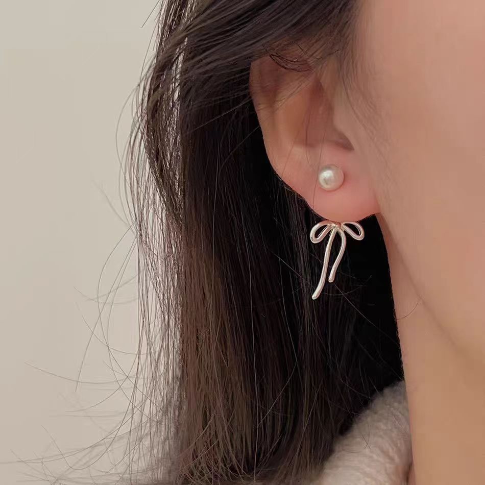 "Ballet atmosphere" Pearl bow tassel Korean-style earrings, mosquito niche sweet and elegant, round face stud earrings full figure