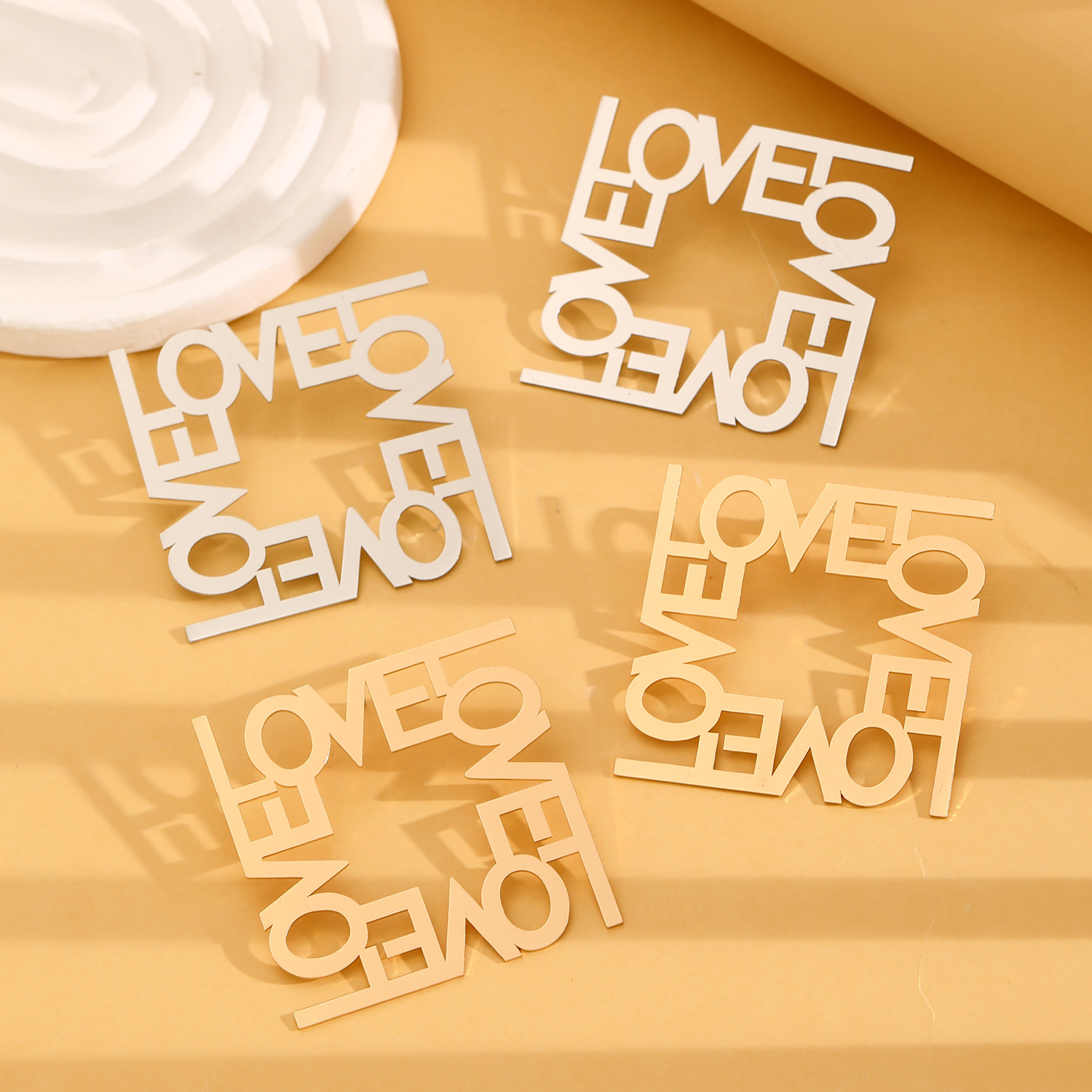 European and American cross-border jewelry, fashionable and exaggerated earrings, LOVE cut letter, high-end and simple earrings, geometric stud earrings Specification drawing