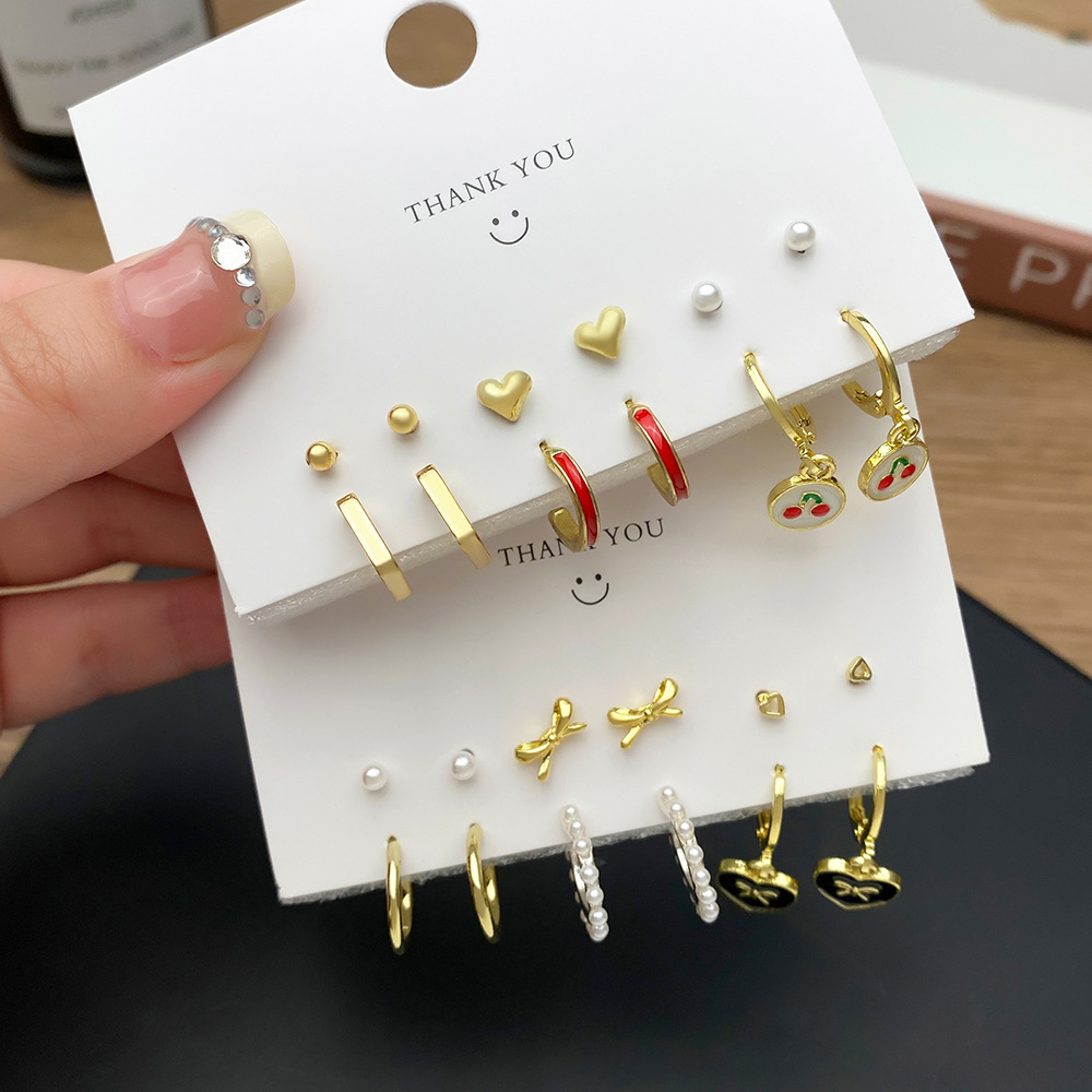 European and American cross-border best-selling fashion trend oil-dripping heart-shaped butterfly imitation pearl earring set for women earrings Specification drawing