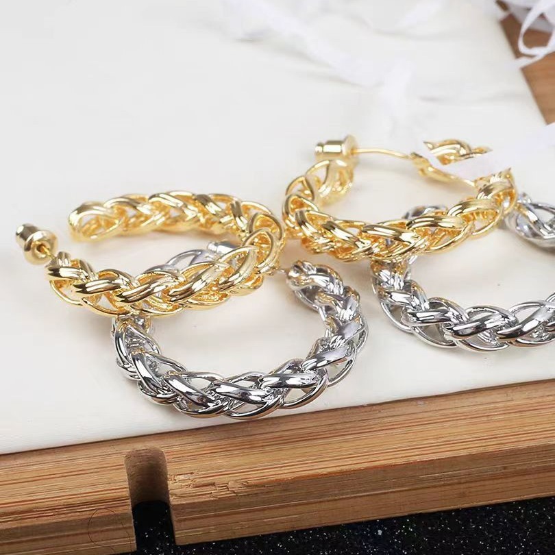 European and American InS-style simple wheat ear and twist woven hollowed-out earrings, C-shaped ring earrings, niche design sense ear rings for women details Picture