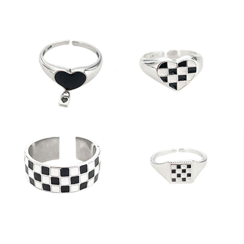 A Korean version of a niche design black and white checkered pattern combination ring, a retro and high-end fashion ring with an ins style for women Item Picture