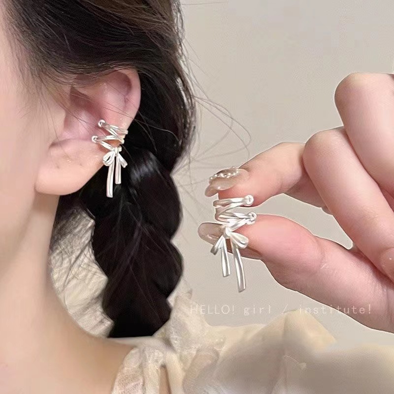 Ballet girl's white bow ear clip, a trendy, sweet, niche and high-end style on Instagram. No ear hole ear bone clip details Picture
