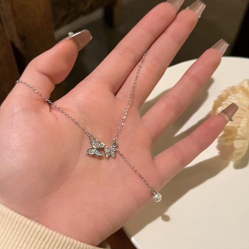 Gentle butterfly tassel pearl necklace for women 2023, a new, niche design with a touch of light luxury and elegant charm details Picture
